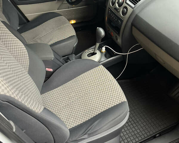 Белый Рено Меган, объемом двигателя 1.6 л и пробегом 236 тыс. км за 4850 $, фото 13 на Automoto.ua