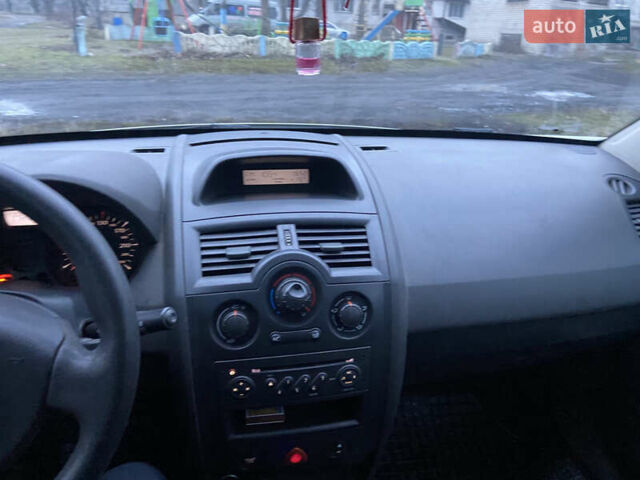 Білий Рено Меган, об'ємом двигуна 1.46 л та пробігом 235 тис. км за 4955 $, фото 7 на Automoto.ua