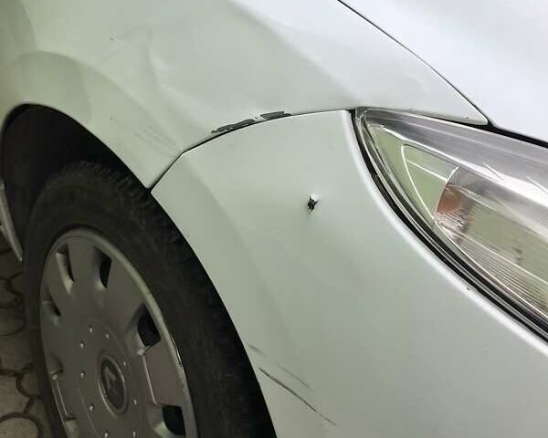 Белый Рено Меган, объемом двигателя 1.5 л и пробегом 250 тыс. км за 6300 $, фото 18 на Automoto.ua