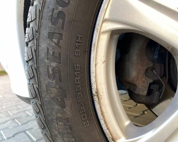 Белый Рено Меган, объемом двигателя 1.4 л и пробегом 218 тыс. км за 6500 $, фото 11 на Automoto.ua