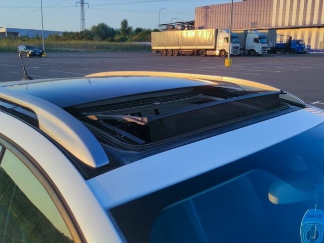 Белый Рено Меган, объемом двигателя 1.5 л и пробегом 198 тыс. км за 9481 $, фото 2 на Automoto.ua