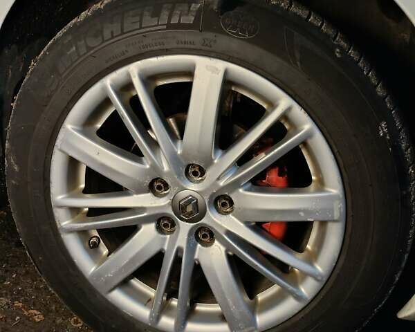 Білий Рено Меган, об'ємом двигуна 1.5 л та пробігом 261 тис. км за 7600 $, фото 36 на Automoto.ua