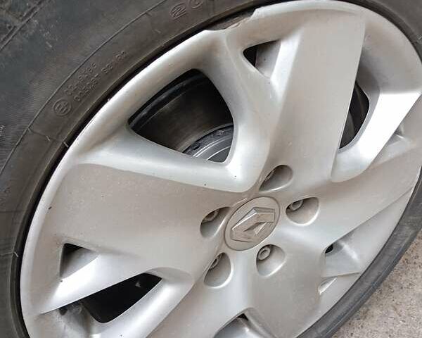 Рено Меган 2012 в Луцке на Automoto.ua Белый Рено Меган, объемом двигателя 1.46 л и пробегом 231 тыс. км за 7900 $, фото 12 на Automoto.ua