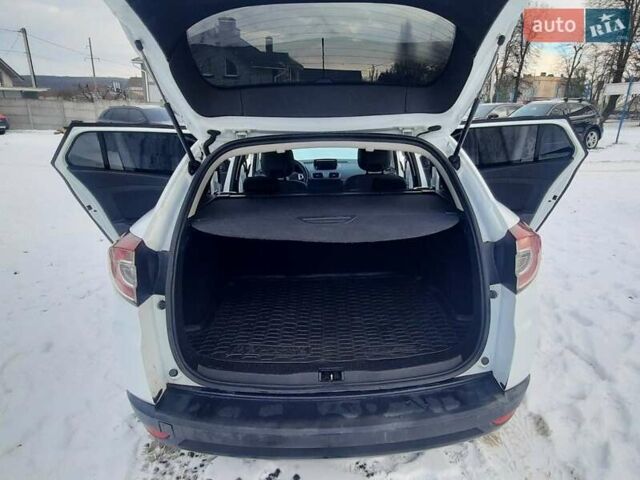 Білий Рено Меган, об'ємом двигуна 1.5 л та пробігом 254 тис. км за 7299 $, фото 19 на Automoto.ua