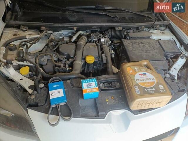 Білий Рено Меган, об'ємом двигуна 1.5 л та пробігом 261 тис. км за 7600 $, фото 48 на Automoto.ua