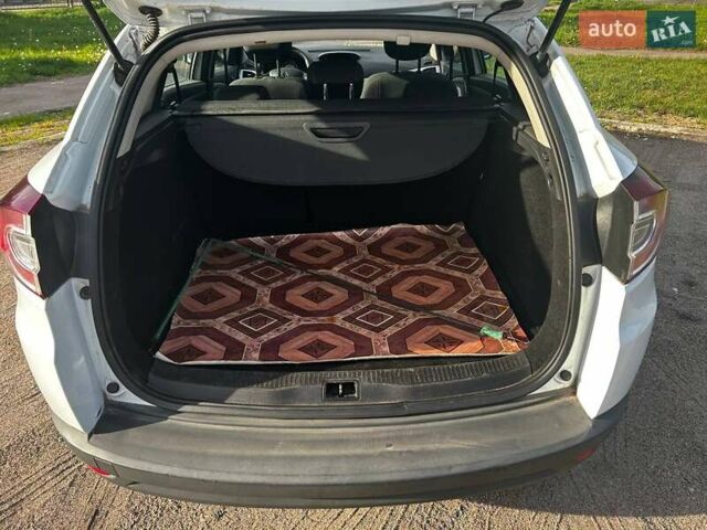 Білий Рено Меган, об'ємом двигуна 1.2 л та пробігом 213 тис. км за 7400 $, фото 4 на Automoto.ua