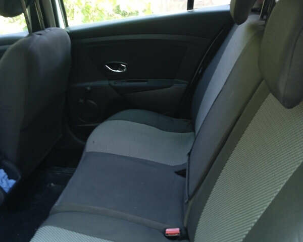 Белый Рено Меган, объемом двигателя 1.5 л и пробегом 196 тыс. км за 8500 $, фото 7 на Automoto.ua