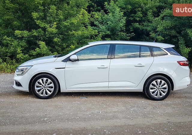 Білий Рено Меган, об'ємом двигуна 1.46 л та пробігом 184 тис. км за 11700 $, фото 4 на Automoto.ua