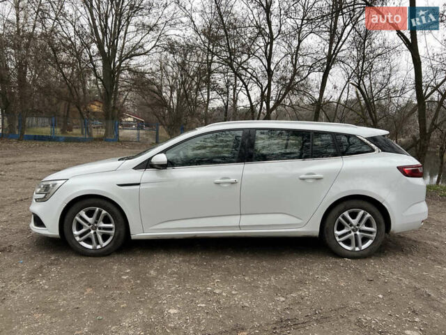 Білий Рено Меган, об'ємом двигуна 1.46 л та пробігом 168 тис. км за 11599 $, фото 1 на Automoto.ua