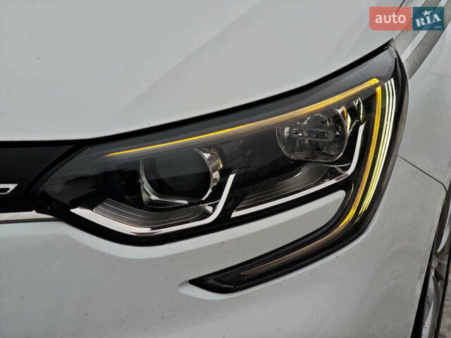 Білий Рено Меган, об'ємом двигуна 1.5 л та пробігом 236 тис. км за 12590 $, фото 4 на Automoto.ua