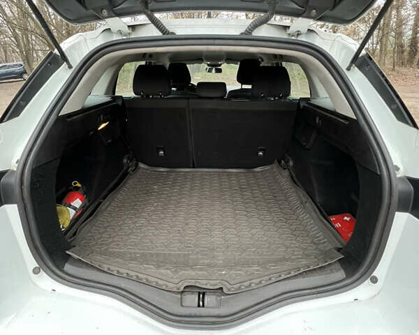 Білий Рено Меган, об'ємом двигуна 1.46 л та пробігом 168 тис. км за 11599 $, фото 6 на Automoto.ua