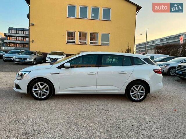 Белый Рено Меган, объемом двигателя 1.46 л и пробегом 225 тыс. км за 11999 $, фото 2 на Automoto.ua