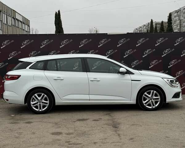 Белый Рено Меган, объемом двигателя 1.5 л и пробегом 202 тыс. км за 15600 $, фото 3 на Automoto.ua