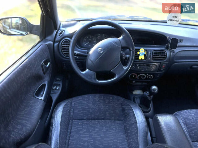 Чорний Рено Меган, об'ємом двигуна 1.6 л та пробігом 169 тис. км за 2800 $, фото 23 на Automoto.ua