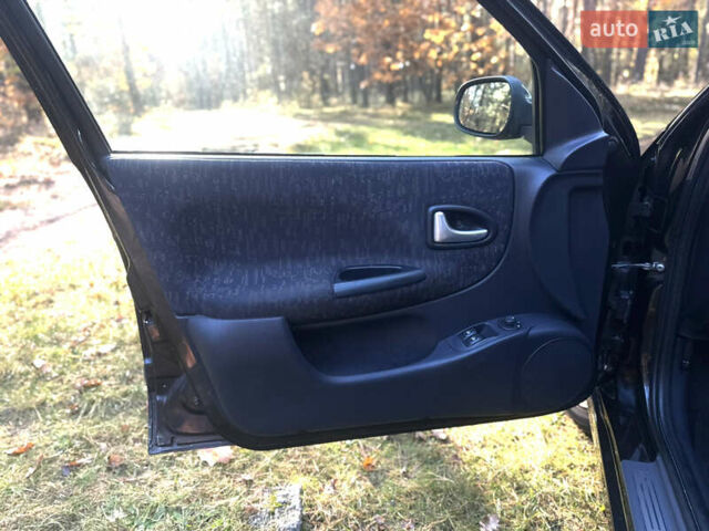 Чорний Рено Меган, об'ємом двигуна 1.6 л та пробігом 169 тис. км за 2800 $, фото 10 на Automoto.ua