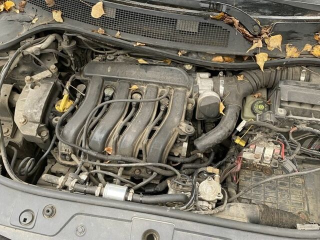 Черный Рено Меган, объемом двигателя 1.6 л и пробегом 250 тыс. км за 2100 $, фото 4 на Automoto.ua