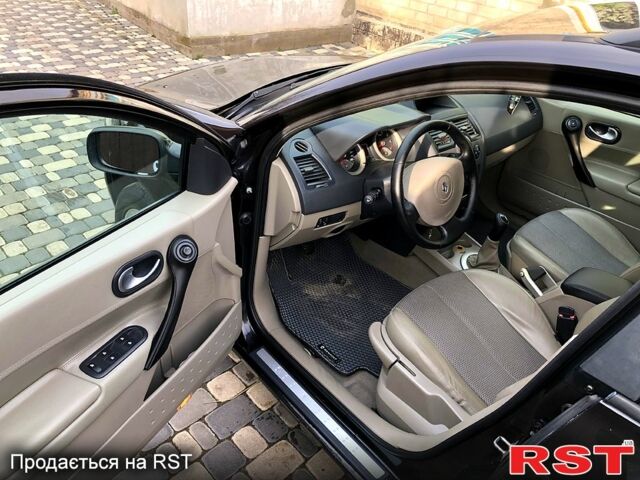 Черный Рено Меган, объемом двигателя 1.6 л и пробегом 189 тыс. км за 5400 $, фото 7 на Automoto.ua