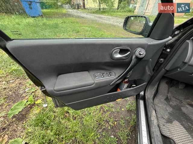 Черный Рено Меган, объемом двигателя 1.6 л и пробегом 229 тыс. км за 4000 $, фото 3 на Automoto.ua