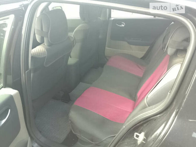 Черный Рено Меган, объемом двигателя 1.5 л и пробегом 311 тыс. км за 3900 $, фото 6 на Automoto.ua