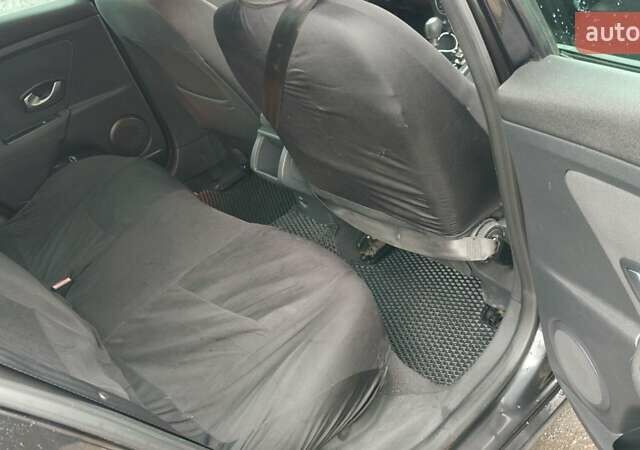 Черный Рено Меган, объемом двигателя 1.5 л и пробегом 241 тыс. км за 5900 $, фото 7 на Automoto.ua