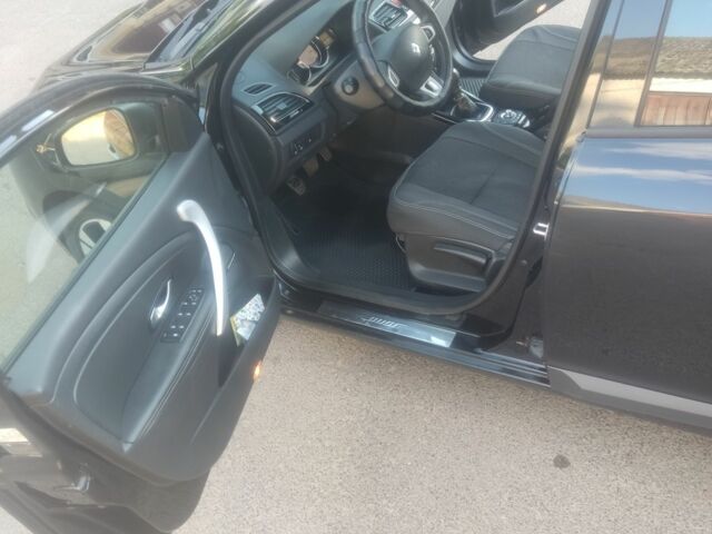 Черный Рено Меган, объемом двигателя 1.5 л и пробегом 220 тыс. км за 7000 $, фото 1 на Automoto.ua