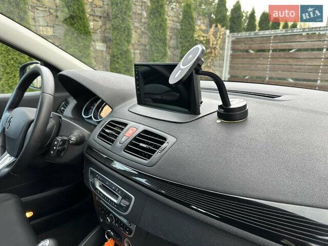 Рено Меган 2011 в Стрые на Automoto.ua Черный Рено Меган, объемом двигателя 1.6 л и пробегом 255 тыс. км за 6950 $, фото 95 на Automoto.ua