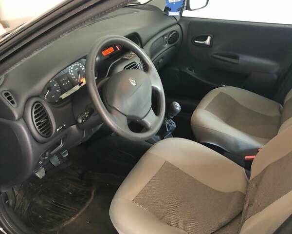 Черный Рено Меган, объемом двигателя 1.39 л и пробегом 72 тыс. км за 5245 $, фото 4 на Automoto.ua