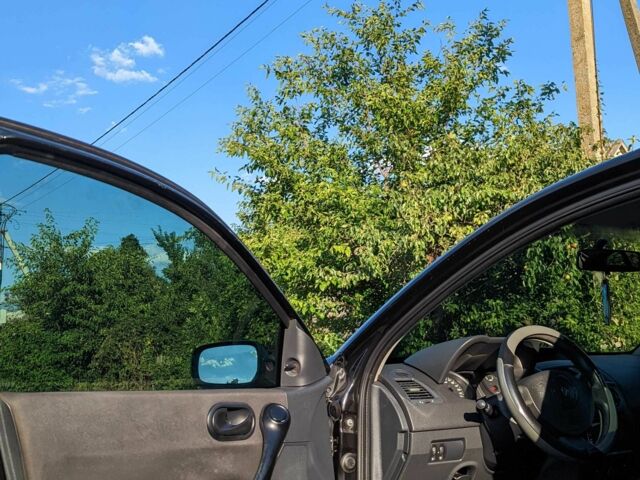 Черный Рено Меган, объемом двигателя 1.4 л и пробегом 230 тыс. км за 3600 $, фото 4 на Automoto.ua