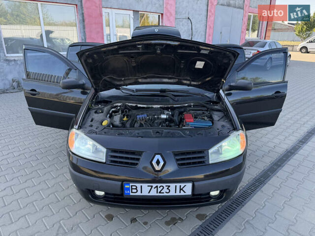 Черный Рено Меган, объемом двигателя 1.6 л и пробегом 297 тыс. км за 4699 $, фото 30 на Automoto.ua
