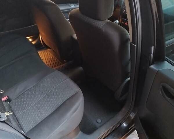 Черный Рено Меган, объемом двигателя 1.6 л и пробегом 310 тыс. км за 4000 $, фото 1 на Automoto.ua