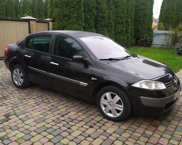 Черный Рено Меган, объемом двигателя 1.6 л и пробегом 246 тыс. км за 5000 $, фото 1 на Automoto.ua