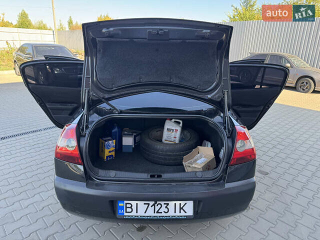 Черный Рено Меган, объемом двигателя 1.6 л и пробегом 297 тыс. км за 4699 $, фото 22 на Automoto.ua