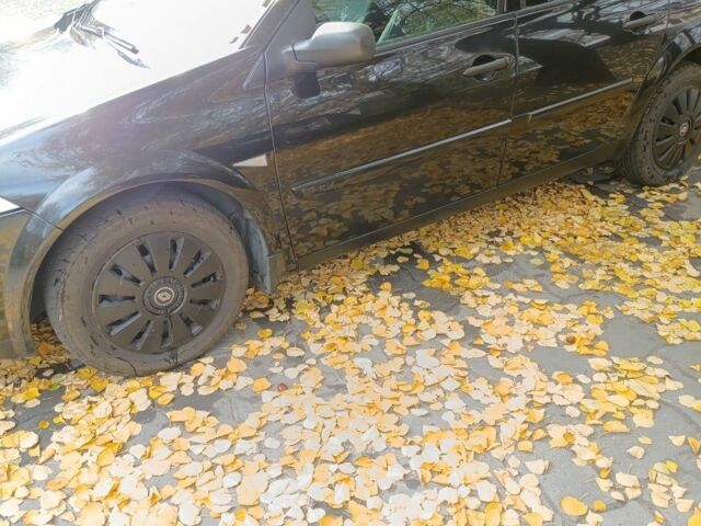 Черный Рено Меган, объемом двигателя 1.6 л и пробегом 238 тыс. км за 4800 $, фото 3 на Automoto.ua