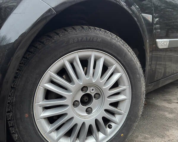 Черный Рено Меган, объемом двигателя 1.6 л и пробегом 295 тыс. км за 4300 $, фото 21 на Automoto.ua