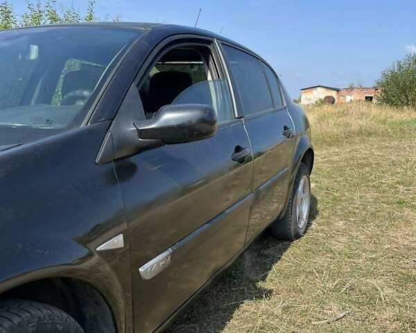 Черный Рено Меган, объемом двигателя 1.6 л и пробегом 182 тыс. км за 4200 $, фото 3 на Automoto.ua