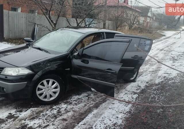 Черный Рено Меган, объемом двигателя 1.6 л и пробегом 211 тыс. км за 6000 $, фото 14 на Automoto.ua