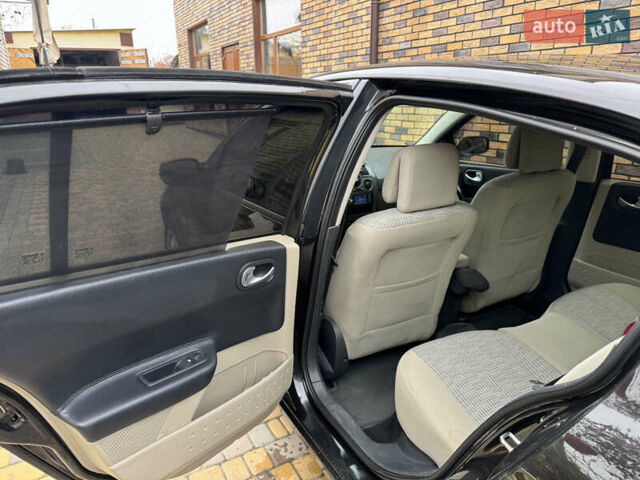 Черный Рено Меган, объемом двигателя 1.6 л и пробегом 151 тыс. км за 4700 $, фото 12 на Automoto.ua