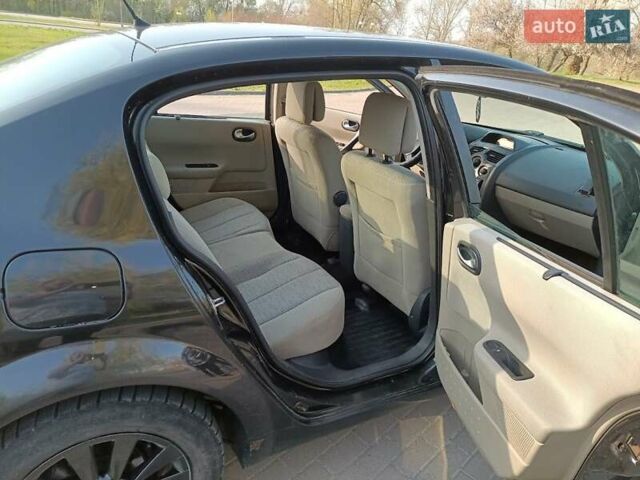 Черный Рено Меган, объемом двигателя 1.6 л и пробегом 210 тыс. км за 4300 $, фото 2 на Automoto.ua