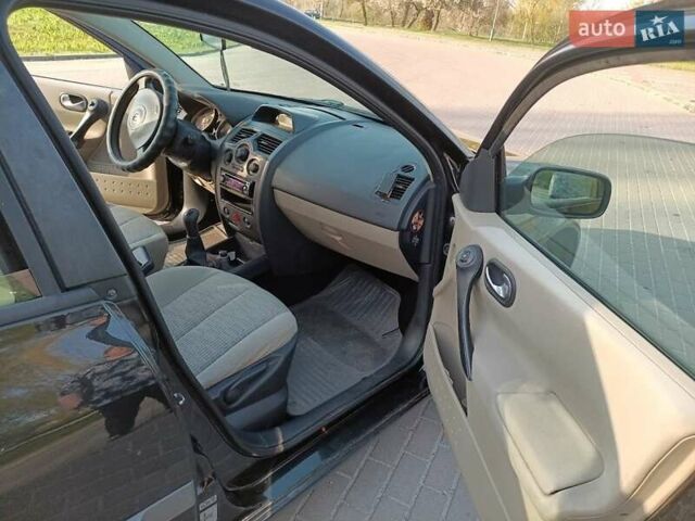 Черный Рено Меган, объемом двигателя 1.6 л и пробегом 210 тыс. км за 4300 $, фото 1 на Automoto.ua