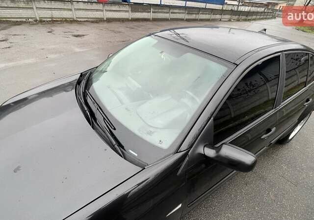 Черный Рено Меган, объемом двигателя 1.39 л и пробегом 281 тыс. км за 4200 $, фото 2 на Automoto.ua