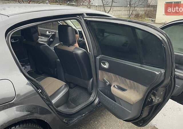 Черный Рено Меган, объемом двигателя 1.39 л и пробегом 281 тыс. км за 4200 $, фото 12 на Automoto.ua