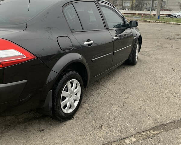 Черный Рено Меган, объемом двигателя 1.6 л и пробегом 170 тыс. км за 5200 $, фото 3 на Automoto.ua