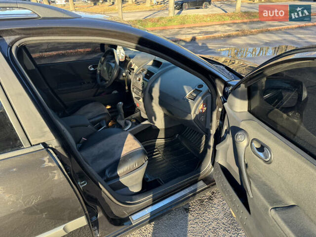 Черный Рено Меган, объемом двигателя 1.6 л и пробегом 293 тыс. км за 4199 $, фото 10 на Automoto.ua