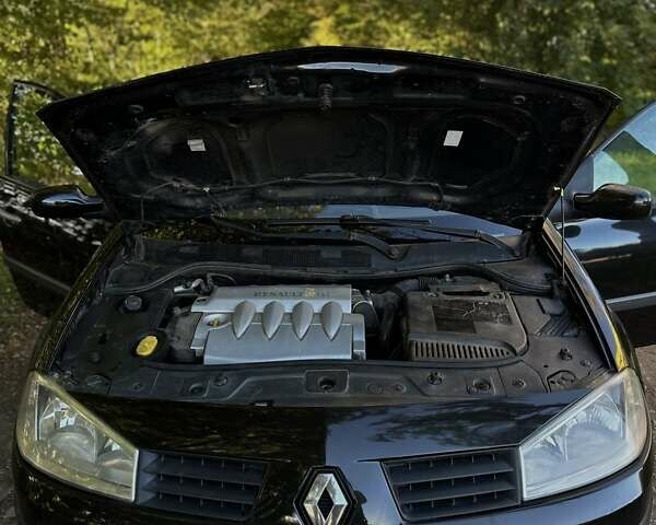 Черный Рено Меган, объемом двигателя 1.6 л и пробегом 250 тыс. км за 3900 $, фото 8 на Automoto.ua