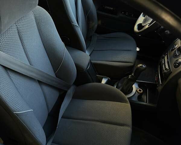 Черный Рено Меган, объемом двигателя 1.6 л и пробегом 250 тыс. км за 3900 $, фото 6 на Automoto.ua