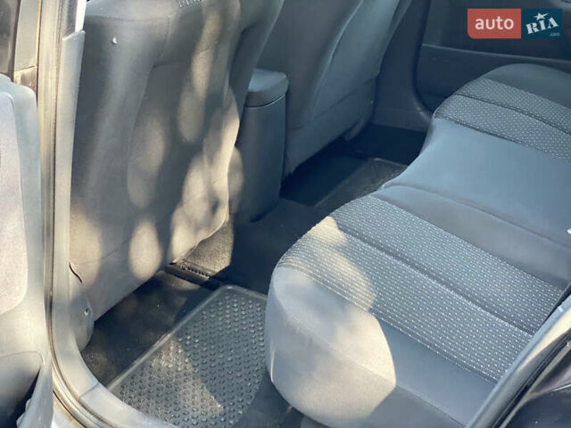 Черный Рено Меган, объемом двигателя 1.6 л и пробегом 230 тыс. км за 4599 $, фото 17 на Automoto.ua