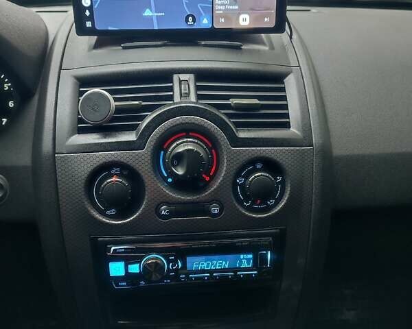 Черный Рено Меган, объемом двигателя 1.6 л и пробегом 206 тыс. км за 6300 $, фото 7 на Automoto.ua