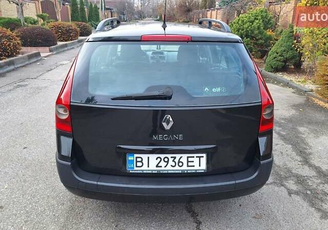Черный Рено Меган, объемом двигателя 1.6 л и пробегом 230 тыс. км за 4950 $, фото 4 на Automoto.ua