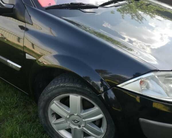 Черный Рено Меган, объемом двигателя 1.46 л и пробегом 267 тыс. км за 4950 $, фото 5 на Automoto.ua