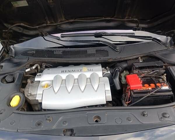 Черный Рено Меган, объемом двигателя 1.6 л и пробегом 255 тыс. км за 4500 $, фото 16 на Automoto.ua